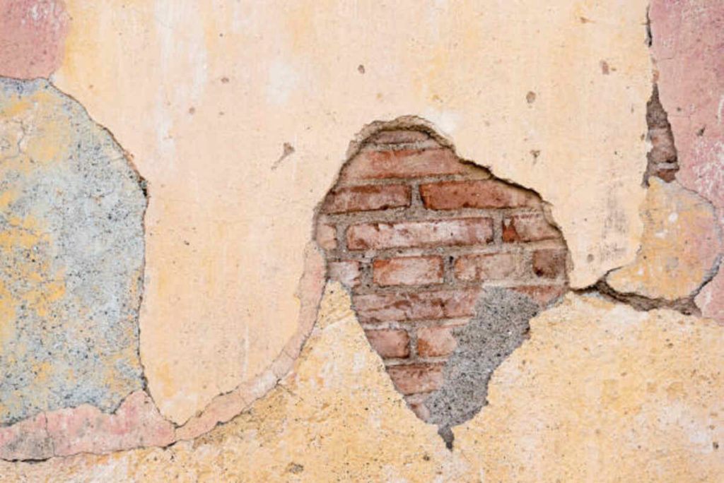 how to fix cracks in walls